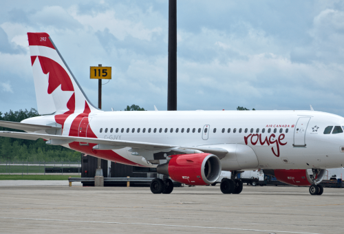 1280px-Air_Canada_Rouge_A319.png
